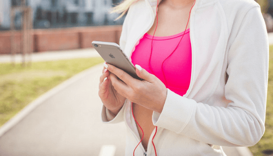 image of woman working out while she waits